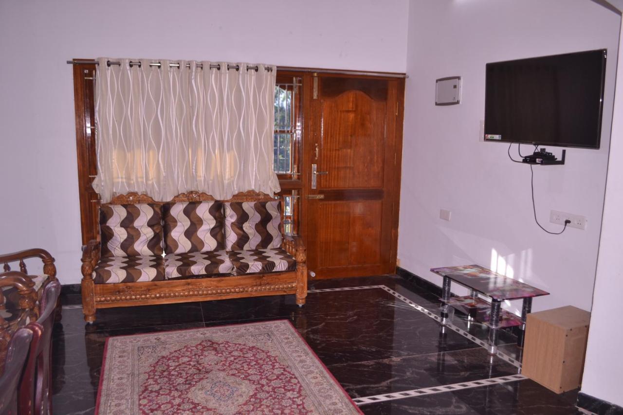 Yuga Guest House Кутталам Экстерьер фото