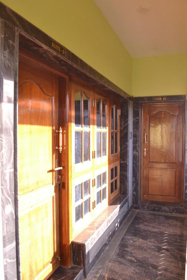 Yuga Guest House Кутталам Экстерьер фото